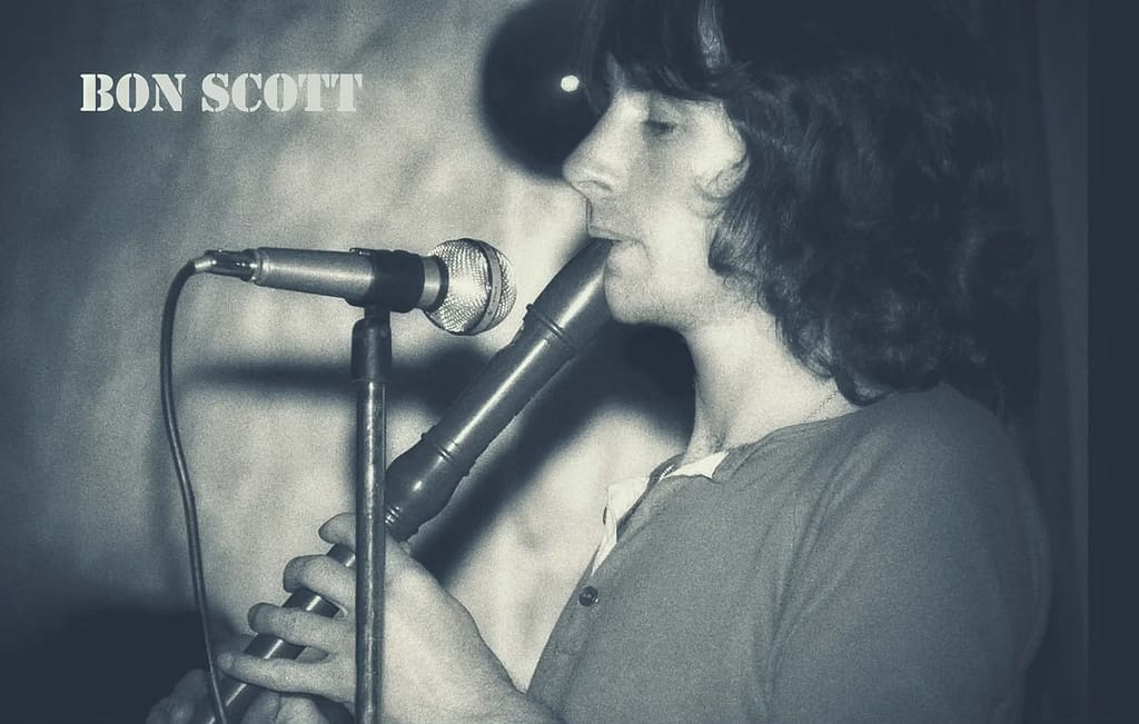 Bon Scott - 1EarthMedia Bon Scott playing the recorder. Harley Parker photo
