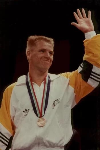 Graham Cheney - 1EarthMedia Australia's Graham 'Spike' Cheney is awarded the Bronze Medal for the Welterweight Division