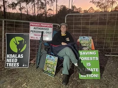 sawmill20230206-01-300 - 1EarthMedia Ella Baker, environmental scientist, locked onto sawmill gate