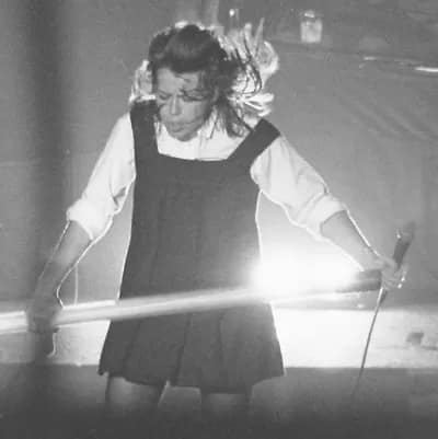 Divinyls4-2-square400 - 1EarthMedia Chrissie Amphlett sings during a performance by Divinyls at Selinas, Coogee Bay © 1983 Mark Anning photo