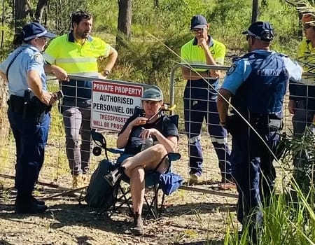sawmill20230206-03-350 - 1EarthMedia Saw mill workers and police surround protester