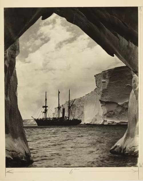 SY Aurora - 1EarthMedia The sheer ice wall of the Mertz Glacier Tongue, Commonwealth Bay, with SY Aurora, photographer Frank Hurley 1911–13