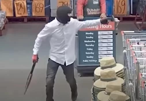 Bunnings003 - 1EarthMedia Bunnings CCTV footage shows a man with a sawn off shot gun