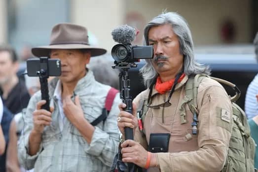 covidphotojournalistsparis - 1EarthMedia Professional photojournalists cover a Covid protest outside AFP headquarters. © 2021 Mark Anning photo