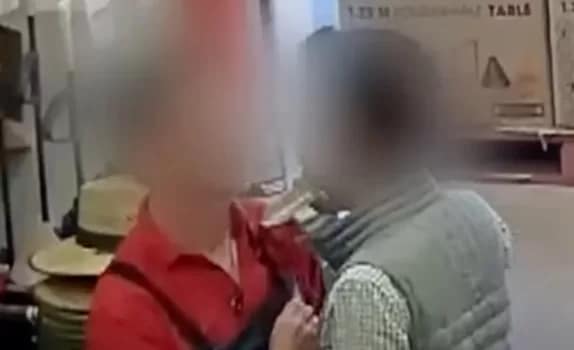 Bunnings004 - 1EarthMedia Bunnings CCTV footage shows a man with a knife held at a staff member's throat