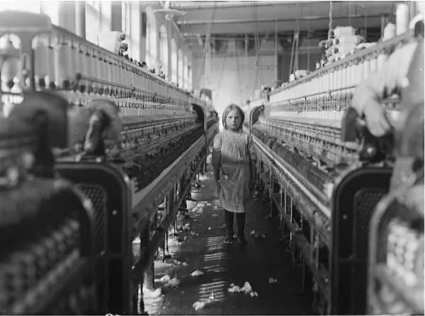 documentary01 - 1EarthMedia Photograph by Lewis W. Hine of a small spinner at Mollohan Mills, Newberry, S.C