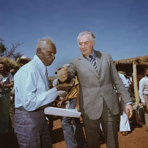 GoughWhitlam - 1EarthMedia Mervyn Bishop, Prime Minister Gough Whitlam pours soil into hand of Traditional Land Owner (Gurindji) Vincent Lingiari, Northern Territory (Wattie Creek) 1975; printed 1990