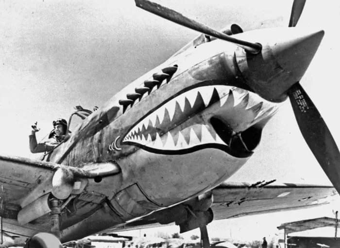 P-40_Flying_Tiger - 1EarthMedia Curtis P-40 aircraft, Flying Tigers
