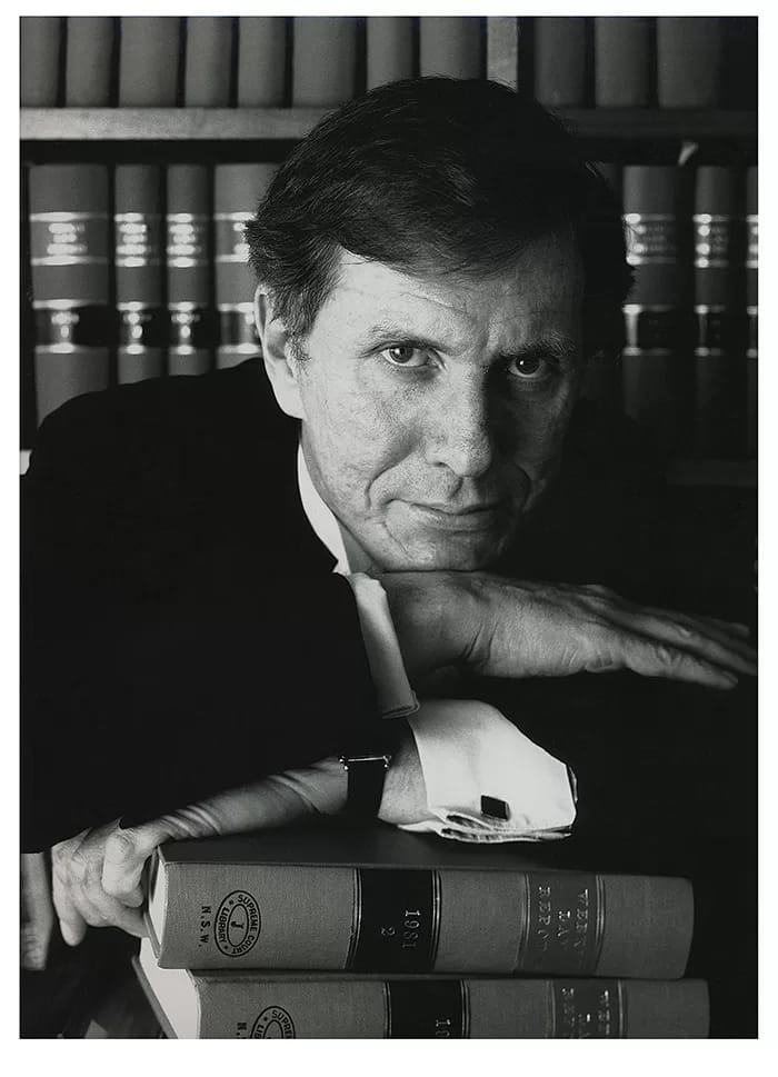 RobWallsMichael-Kirby - 1EarthMedia Justice Michael Kirby in his Sydney chambers. Good Weekend magazine for series of portraits of prominent Australians.1988. T_Max 400, Toyoview Studio monorail, camera Nikkor 150mm lens. Rob Walls photo