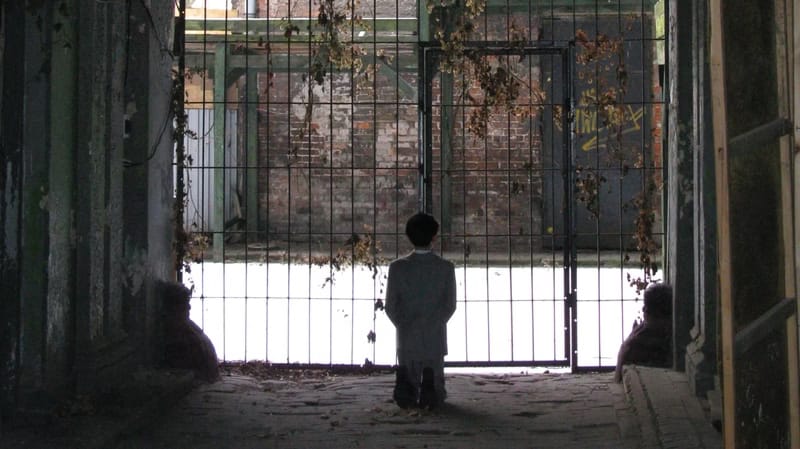 Cattelan-Hitler-Him-insitu - 1EarthMedia Maurizio Cattelan’s Him (2001)