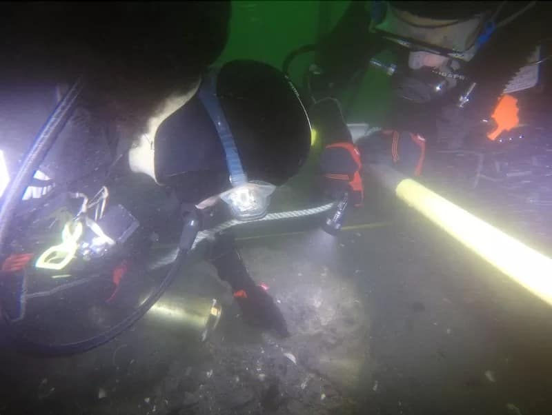 Endeavour Newport - 1EarthMedia Irini Malliaros from the Silentworld Foundation uses a water-induction dredge to excavate part of the midships section of Endeavour