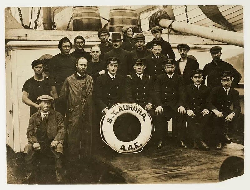 SYaurora_crew on board Fletcher - 1EarthMedia Aurora’s Captain John King Davis, officers and crew, 1912-13, photographer Leslie Hinge