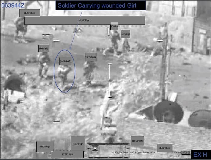 023 - 1EarthMedia Exhibit H – 0639:44 Z Still from Apache Gun Camera Film showing Evacuation of Iraqi girl from black van.